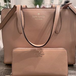 Kate Spade Medium top zipped Satch with large continental wallet.